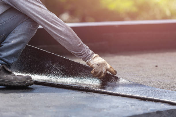 Professional Basement Waterproofing technician working in Winnebago, IL